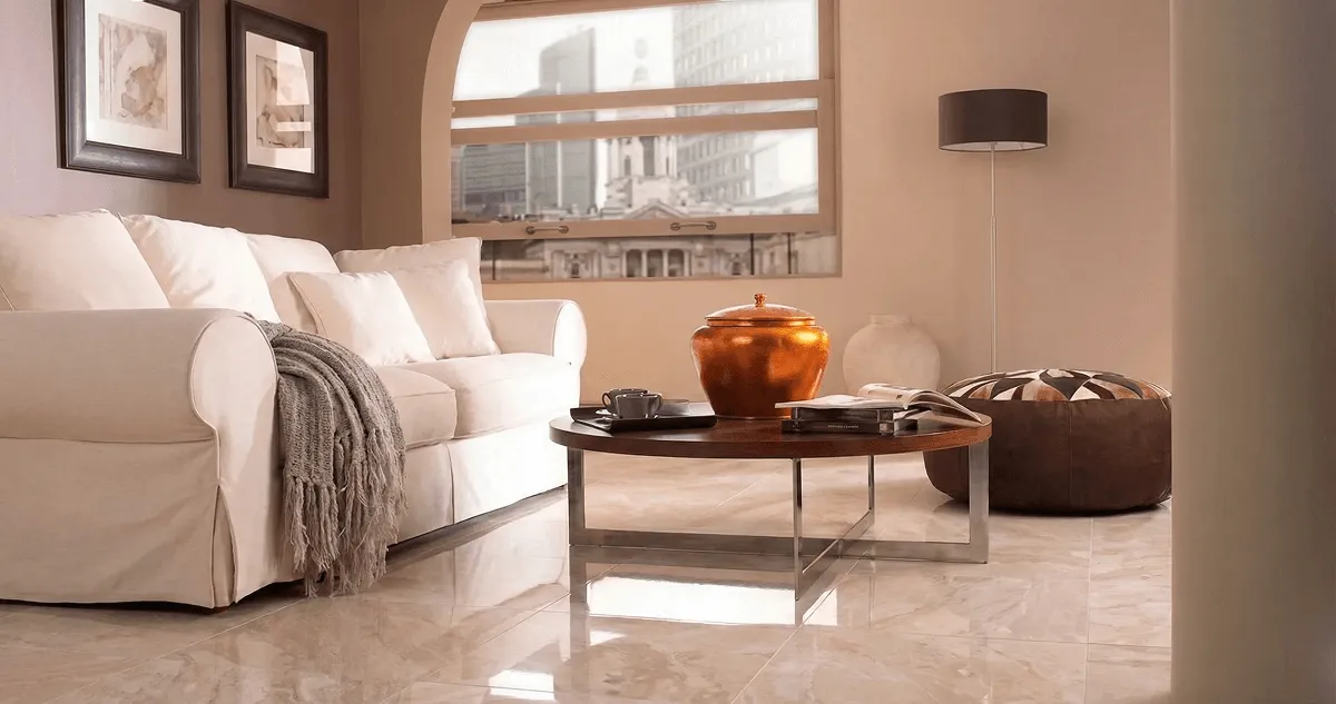 Modern living room with professionally installed marble flooring, a beige sofa, coffee table in Arlington, TX